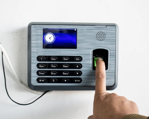 Person Punching on Biometric Machine